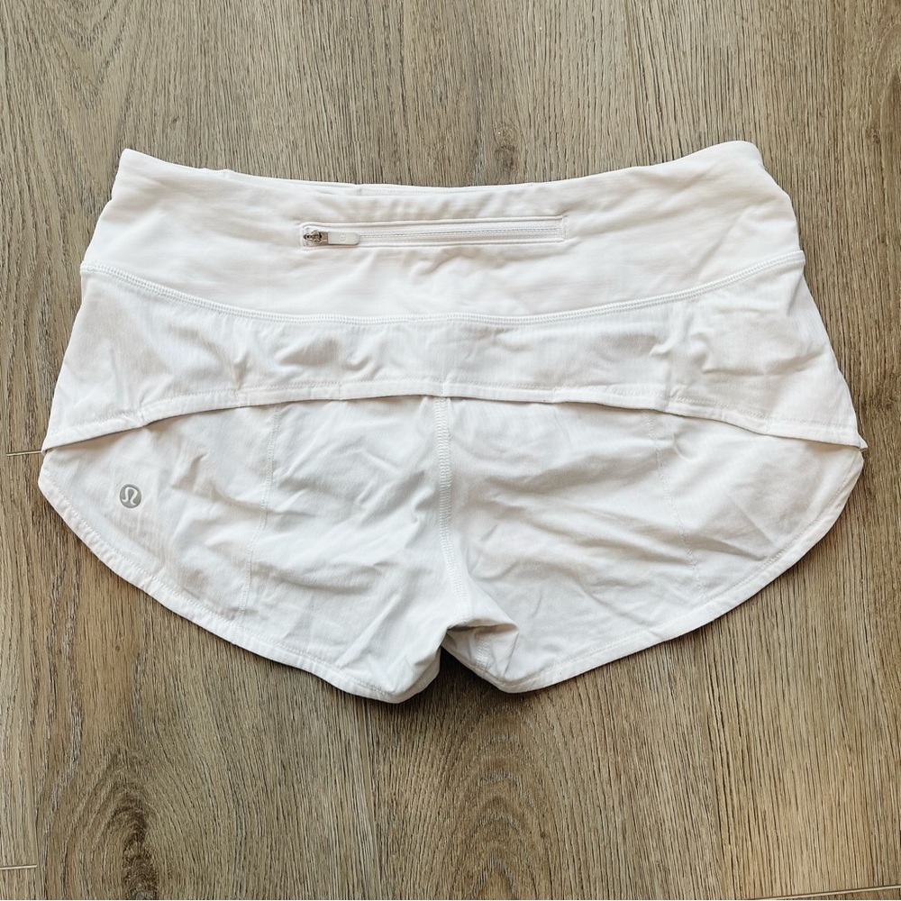 white speed up shorts